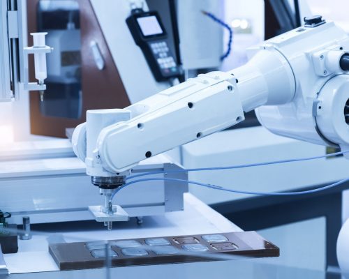 Robotic,Arm,At,Production,Line,In,Factory